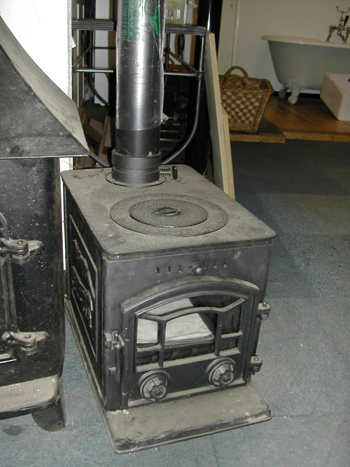 Small log burner Ben's Tiles and Reclamation Ltd